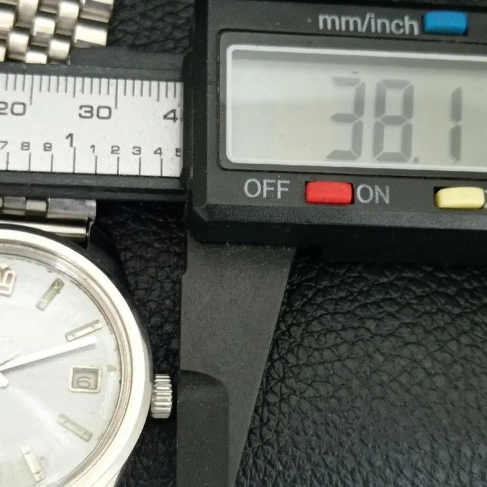 Vintage 1975 Citizen Manual Mens Silver Watch W/date & Crown accents